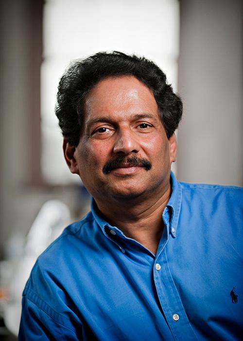 Mas Subramanian in YInMn blue shirt