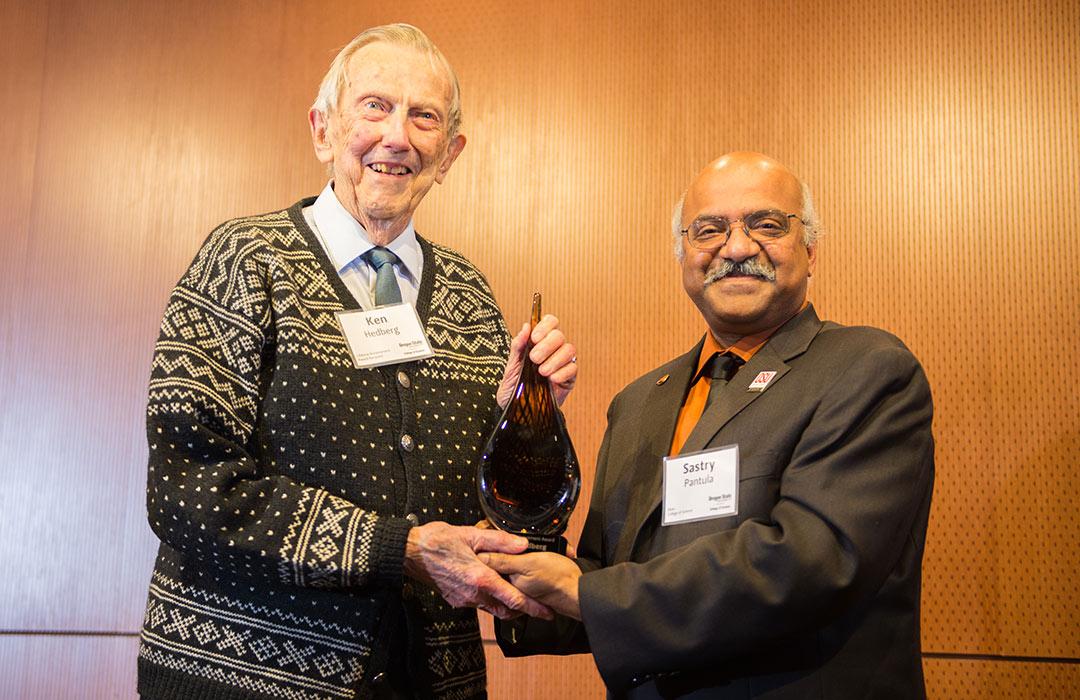 Ken Hedberg receiving award from Sastry Pantula
