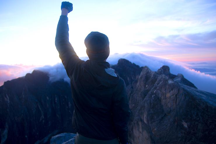 Dang Duong silhouette on mountain at sunrise