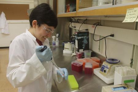 Nicole Kirchoff working with samples in lab