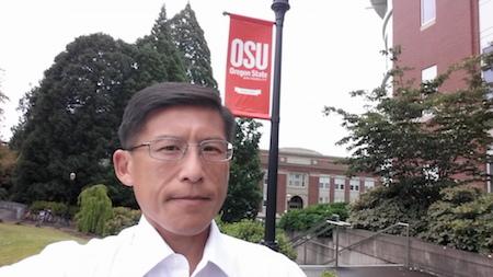 Tze-Yiu Yong standing outside the Valley Library