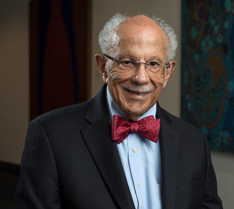 Warren Washington standing in office space