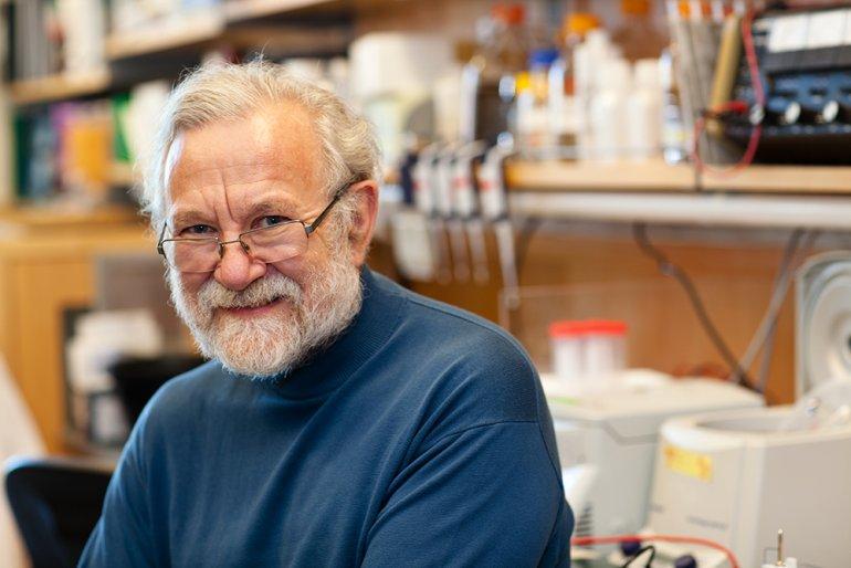 Peter Walter sitting in lab