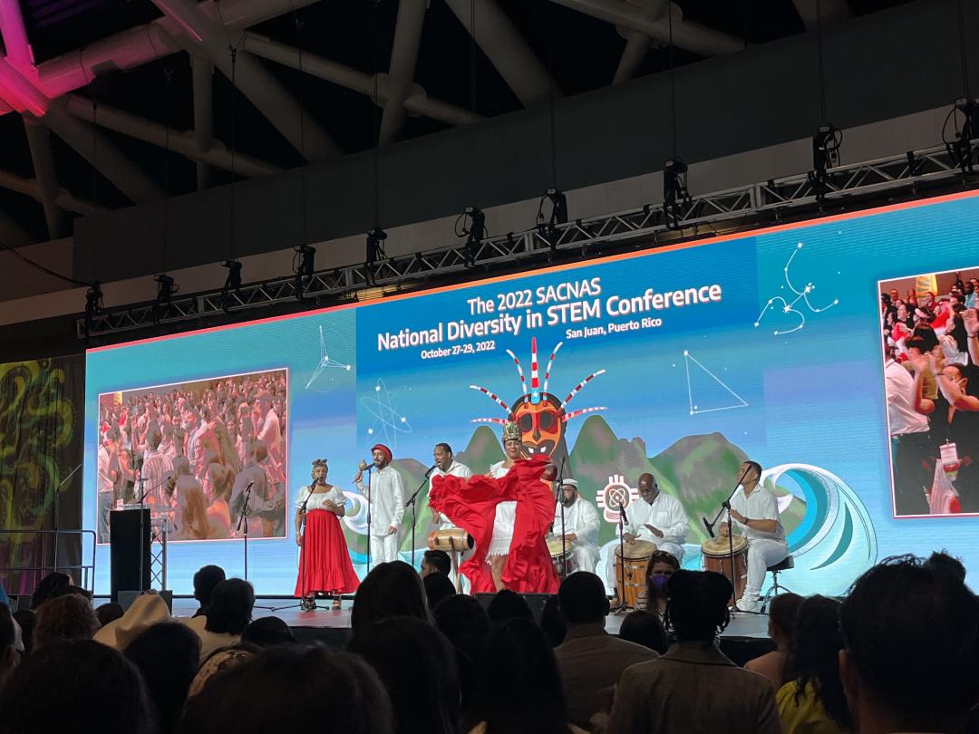 Performers dance on a stage during SACNAS conference.