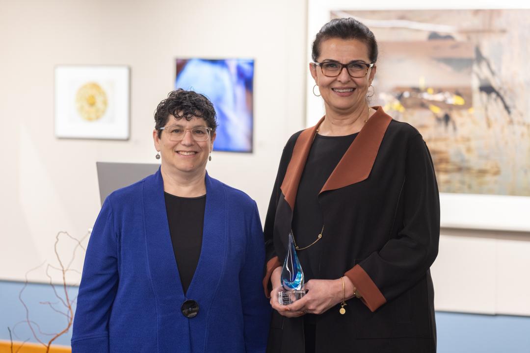 Parisa Khosropour accepts an award.