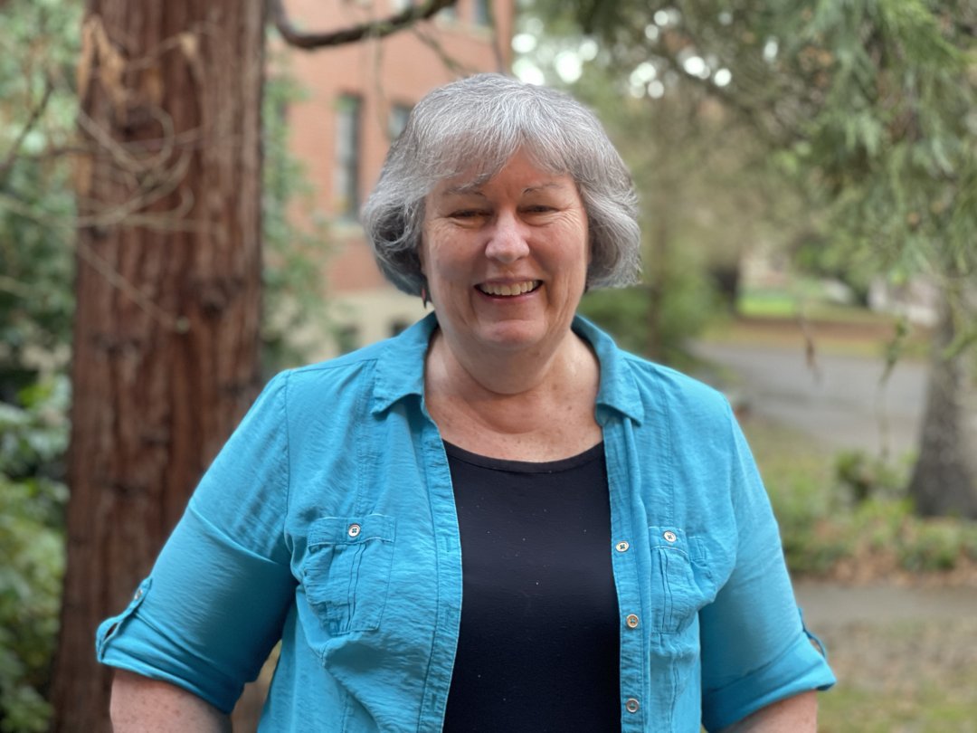 Headshot of Margie Haak in blue top.
