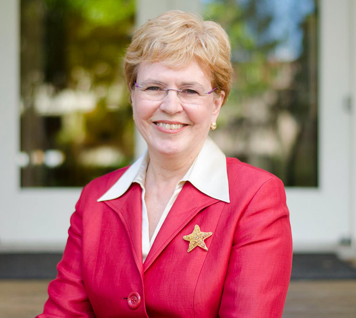 Jane Lubchenco sitting outdoors