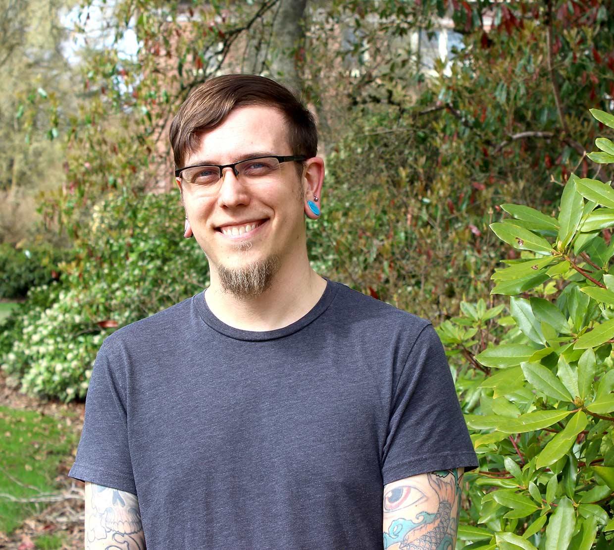 David Lynn Hubert in front of shrubbery