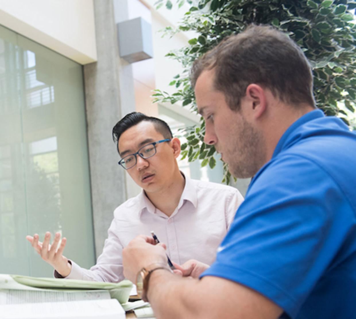 two students working at a table in Kelly Engineering Center