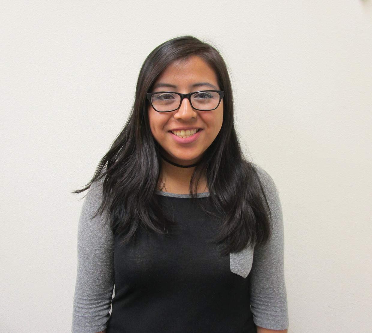 portrait of Maria Lachino in front of white wall