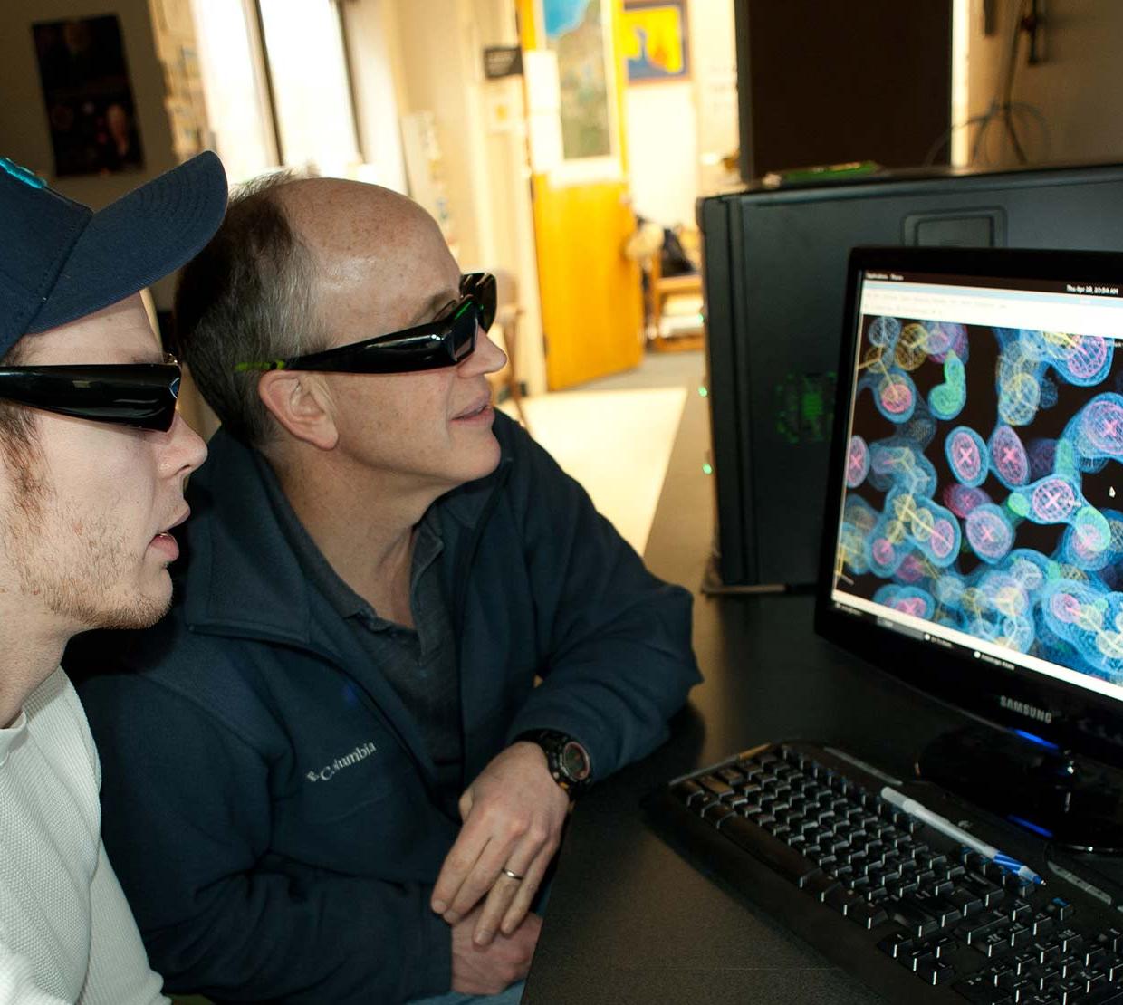 Andy Karplus and student analzying X-ray crystallography experiments