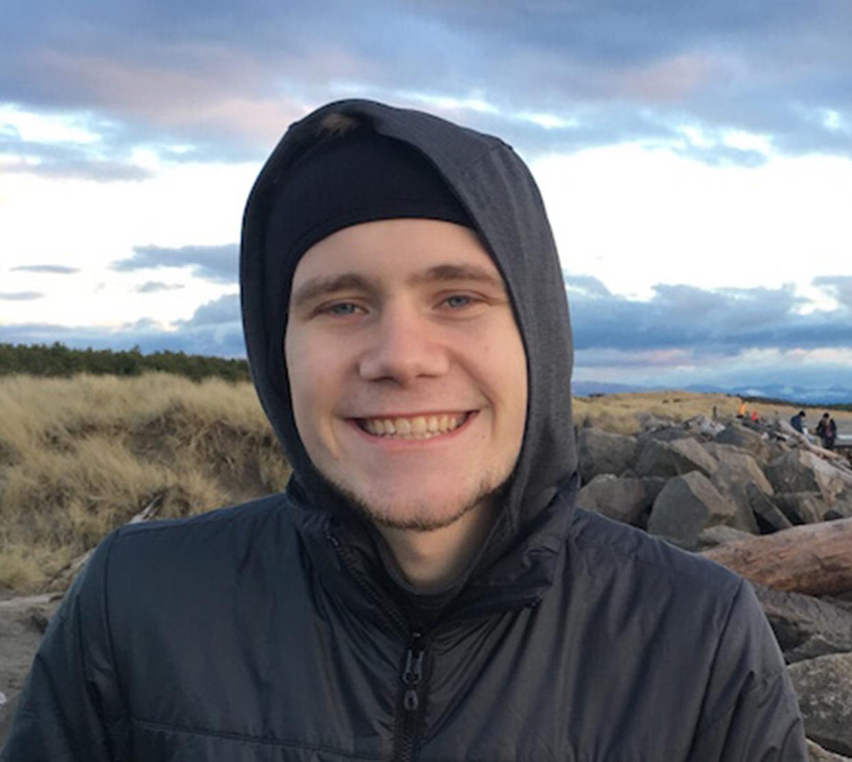 Jason Sandwisch standing in Oregon coastal field