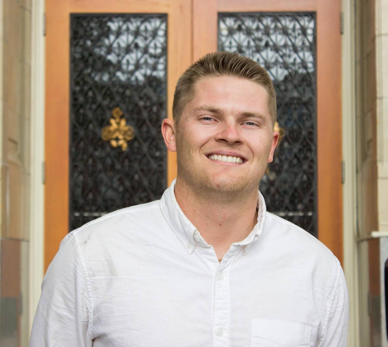 Morgan Pearson in front of Kidder Hall