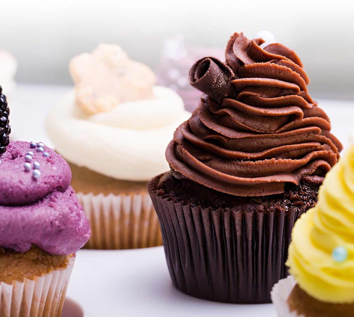 cupcakes sitting on white table