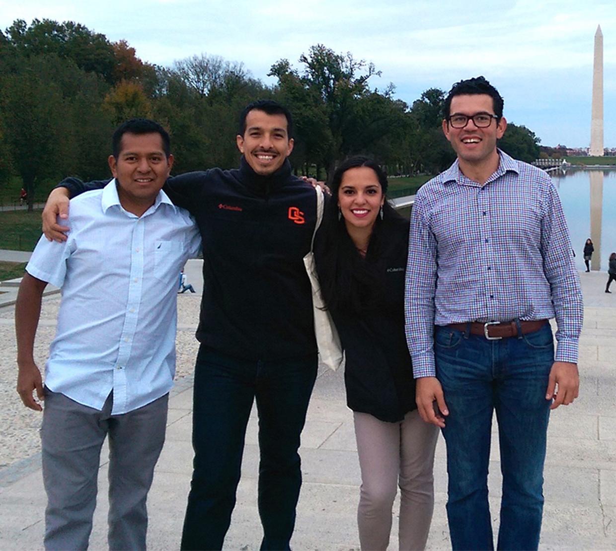 Group photo of representatives in front of Washington DC viewpoint