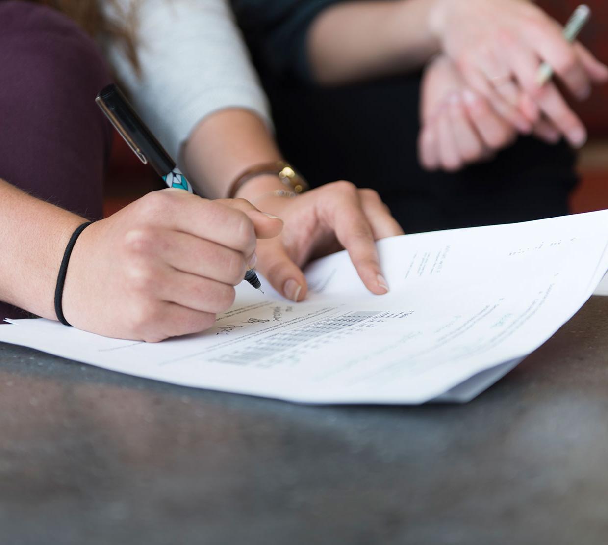 Two women working on homework in the Learning Innovation Center