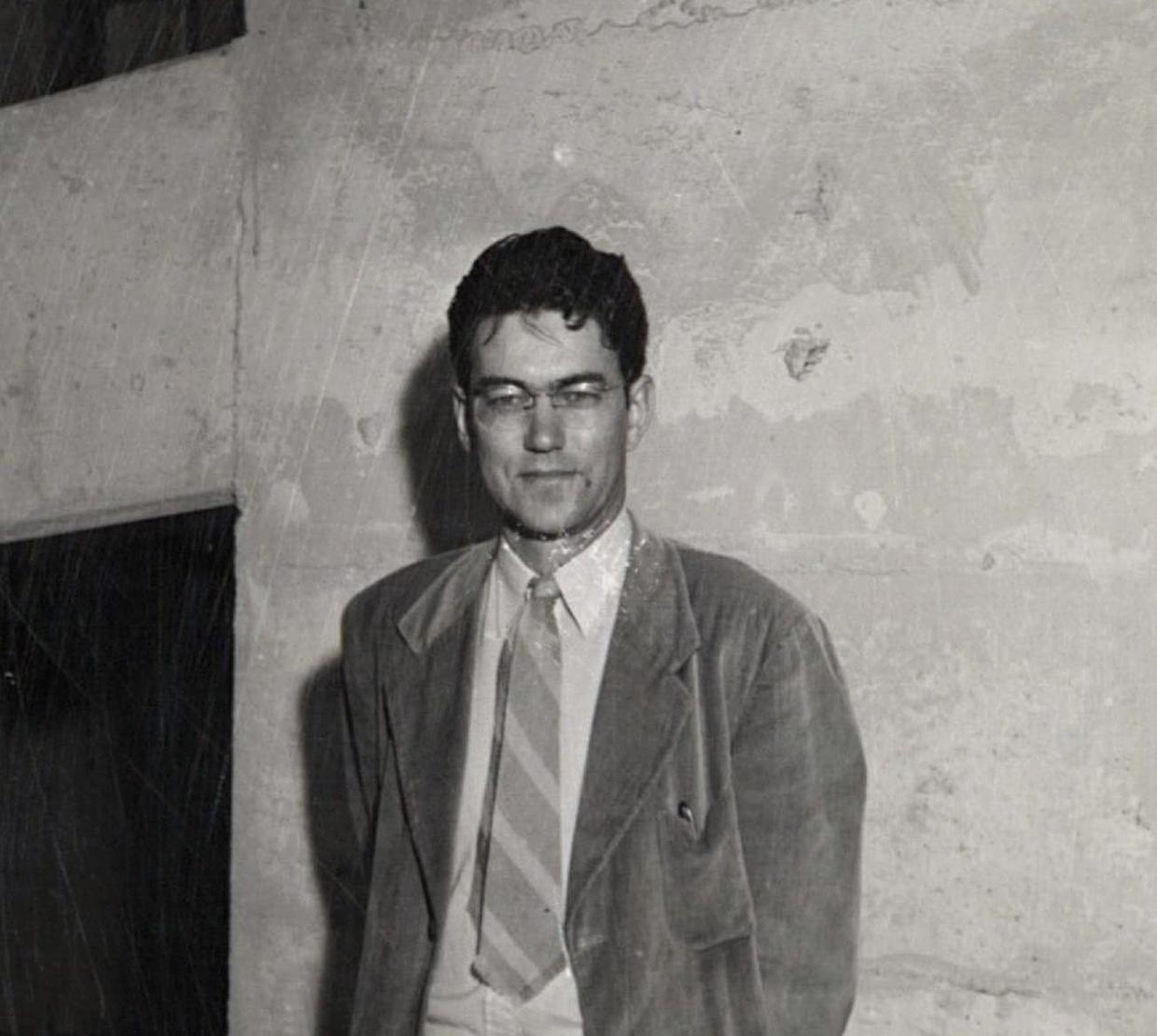 Vintage black and white picture of Arvid T. Lonseth in front of concrete wall