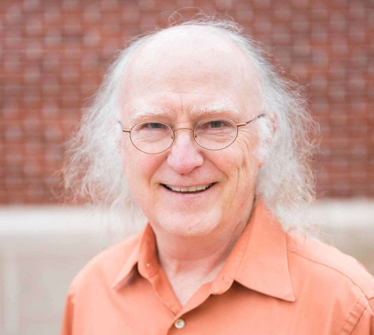 Kevin Ahern standing in the SEC awning