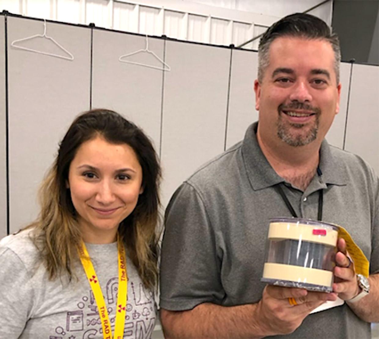 Ana Arteaga with PNNL engineer at booth