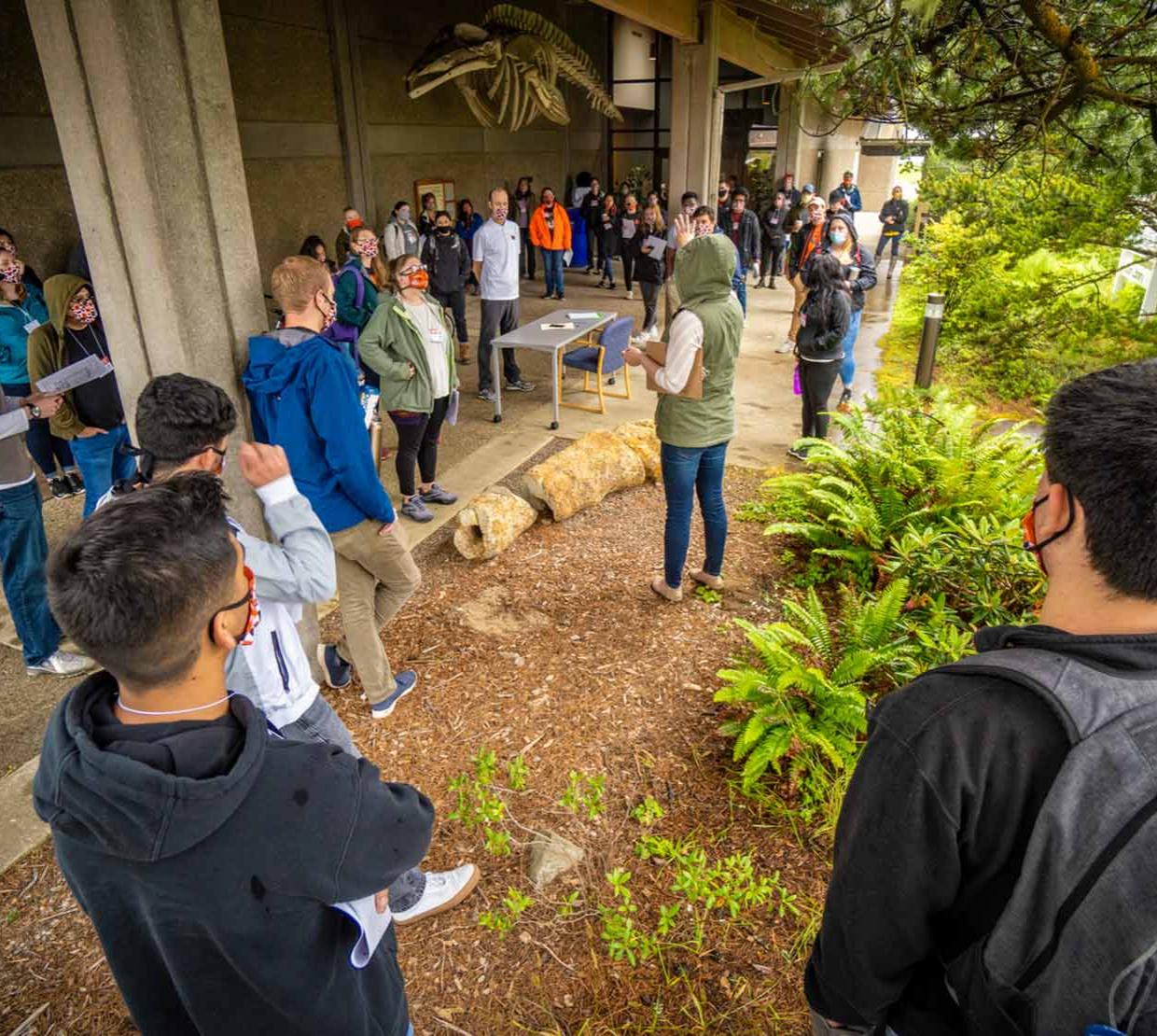TRACE workers standing in outdoor meeting space in Newport
