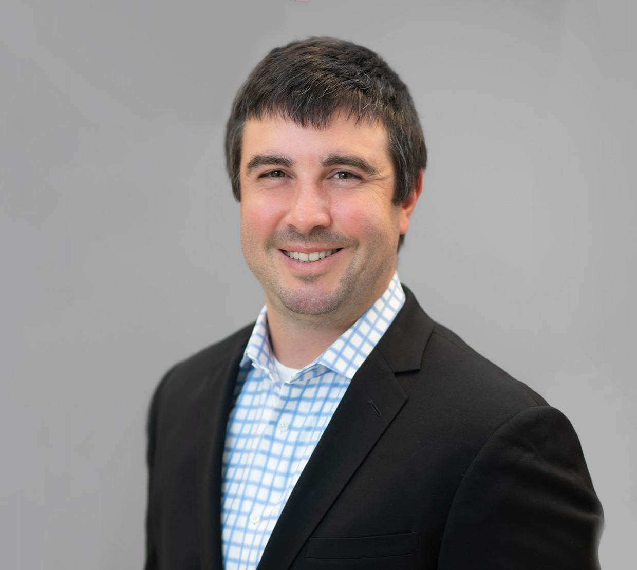 Professional photo of Theodore Zavalas in a suit