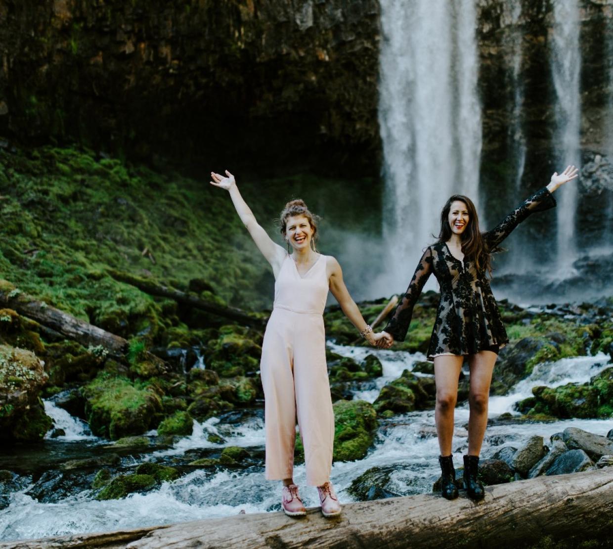 Heather Masson-Forsythe with her sister, Margaux, at a waterfall