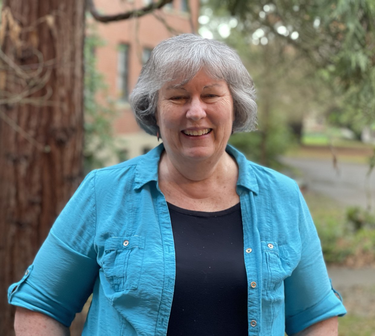Headshot of Margie Haak in blue top.