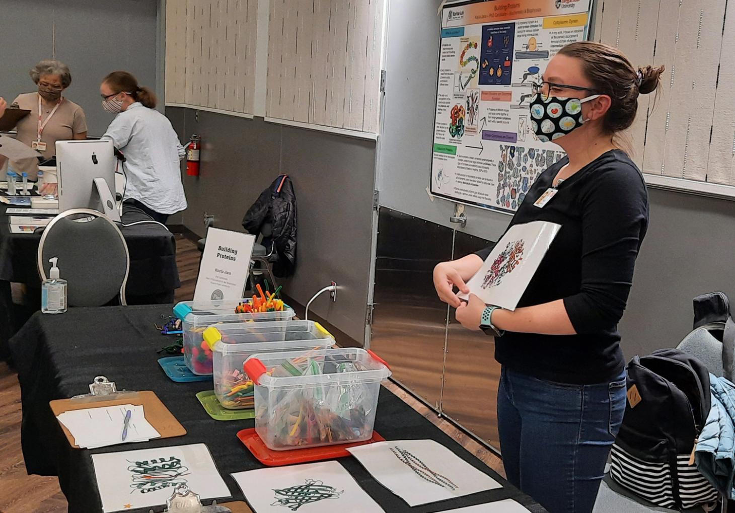 Biochemist Kayla Jara presenting at OMSI