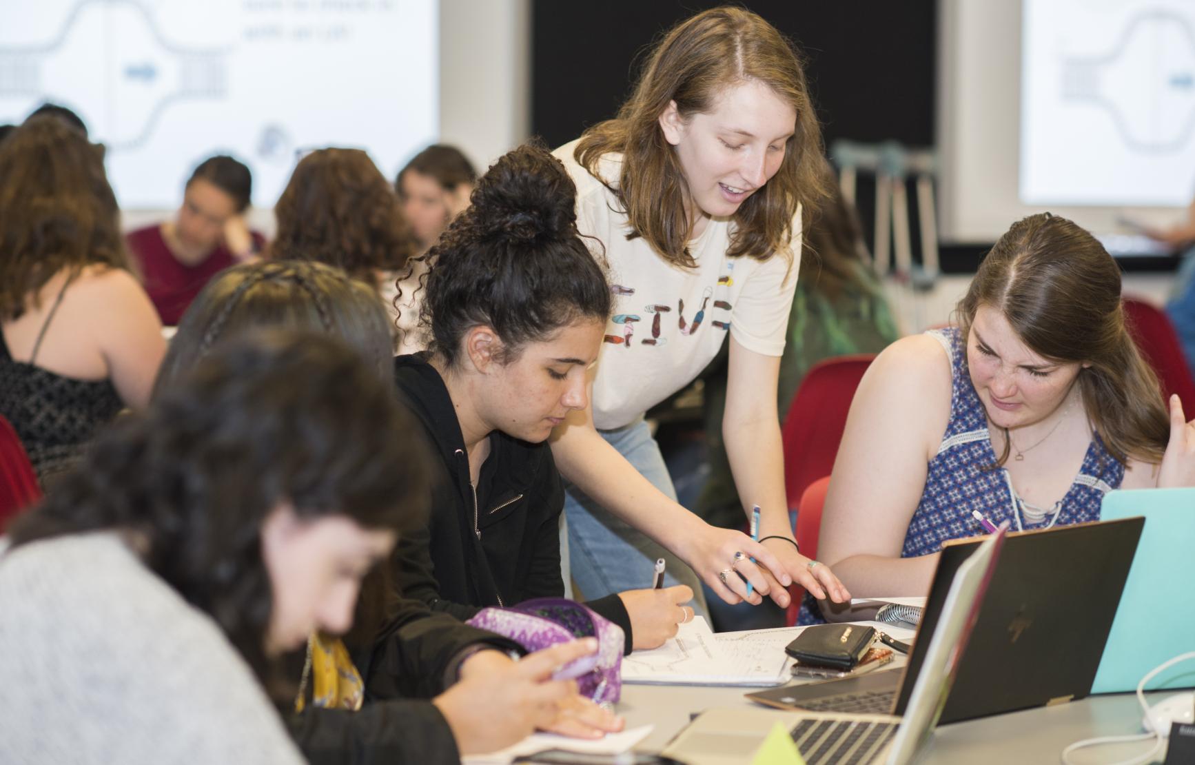Learning Assistants in lecture.
