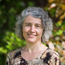 Christine Escher in front of trees