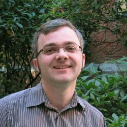 Paul Blakemore standing in front of Kidder Hall