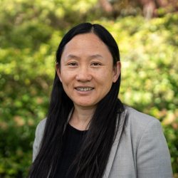 Headshot of Lan Xue outside Kidder Hall