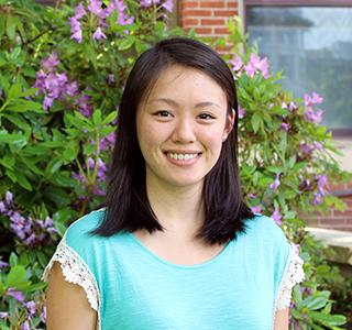 Tyler Mendes in front of Kidder Hall