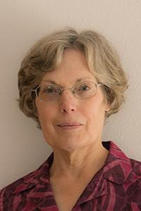 Eileen Hartmann in front of grey backdrop