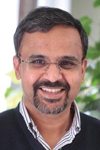 Prabu Nambiar in front of shrubbery