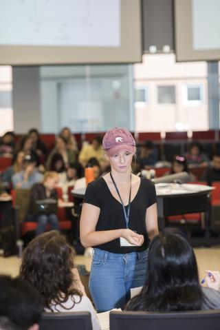 A Learning Assistant working with students in lecture.