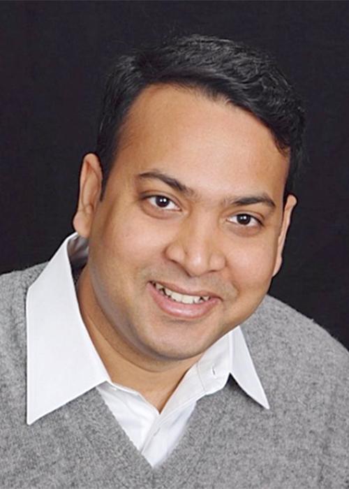 Dipankar Koley in front of black backdrop