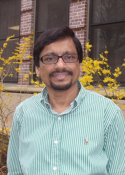Mahfuzur Sarker standing in front of Dryden Hall