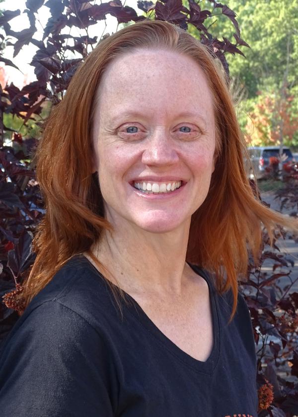 Headshot of Allison Evans standing outside on Oregon State University campus