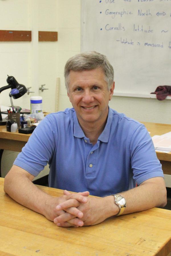 Potrait seated at a table