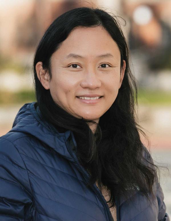 Headshot of Lan Xue smiling on campus