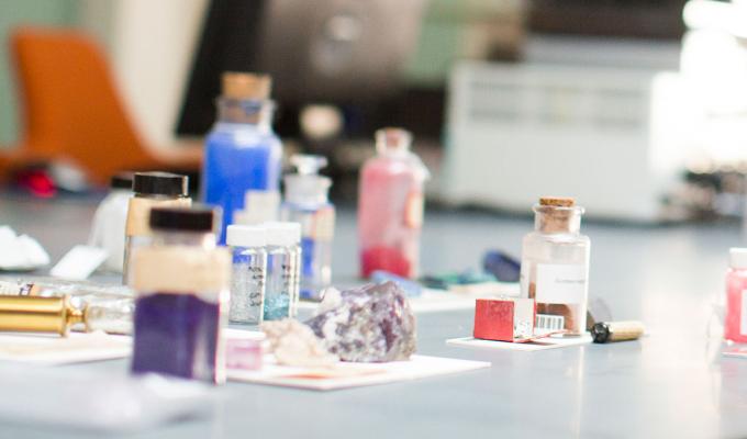 Color pigments in viles on lab table