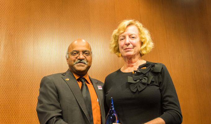 Gretchen Schuette receiving award from Sastry Pantula