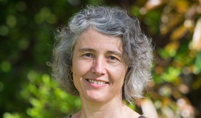 Christine Escher in front of trees