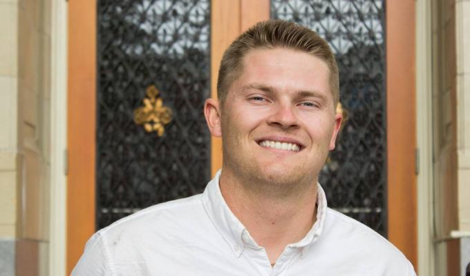 Morgan Pearson in front of Kidder Hall