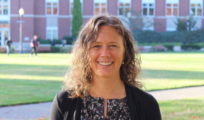 Cori Hall standing outside Kidder Hall