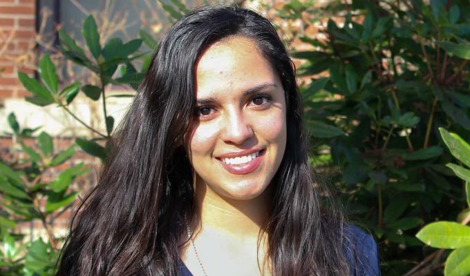 Stephanie Pleasant standing in front of Kidder Hall