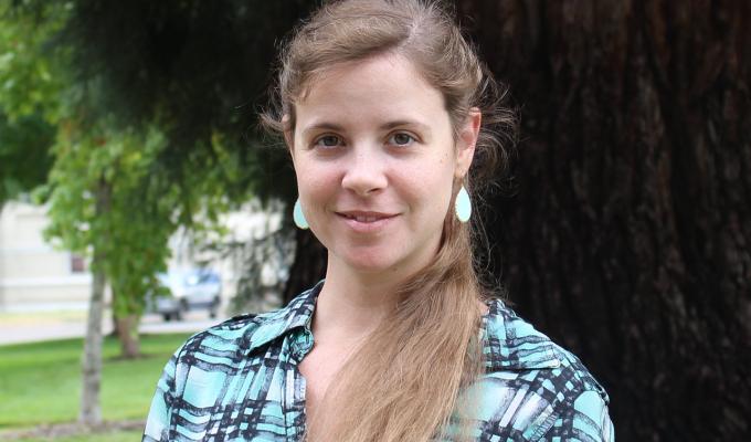 Holland Elder standing in front of tree