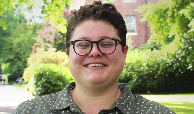 Melissa Lee standing outside Kidder Hall