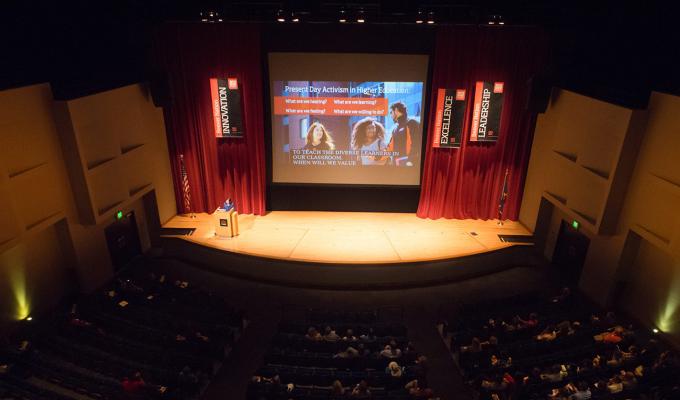 audience sitting in lecture hall